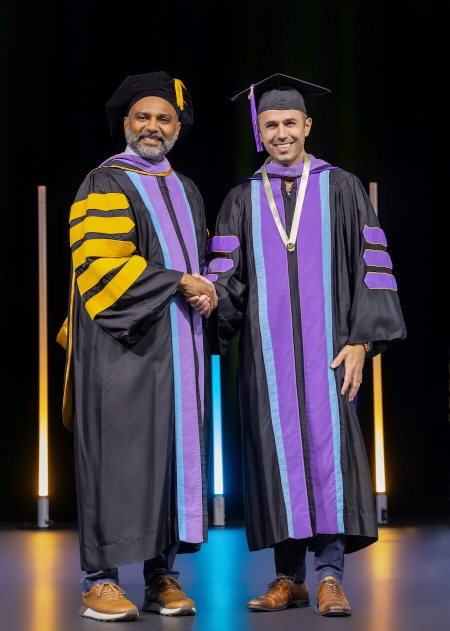 Dr. Deniakos Handshake Graduation